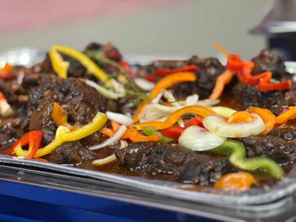 Hearty braised oxtails served at a San Bernardino event