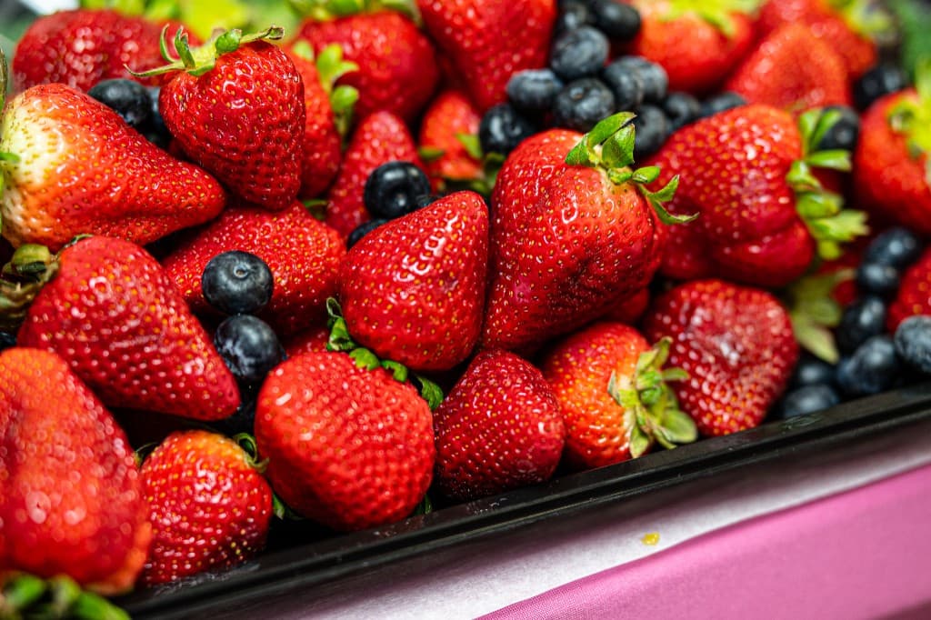 Tray of fresh strawberries and blueberries